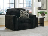 Ashley Furniture Midnight-Madness oversized chair with plush fabric and wide seating, perfect for lounging and relaxation.