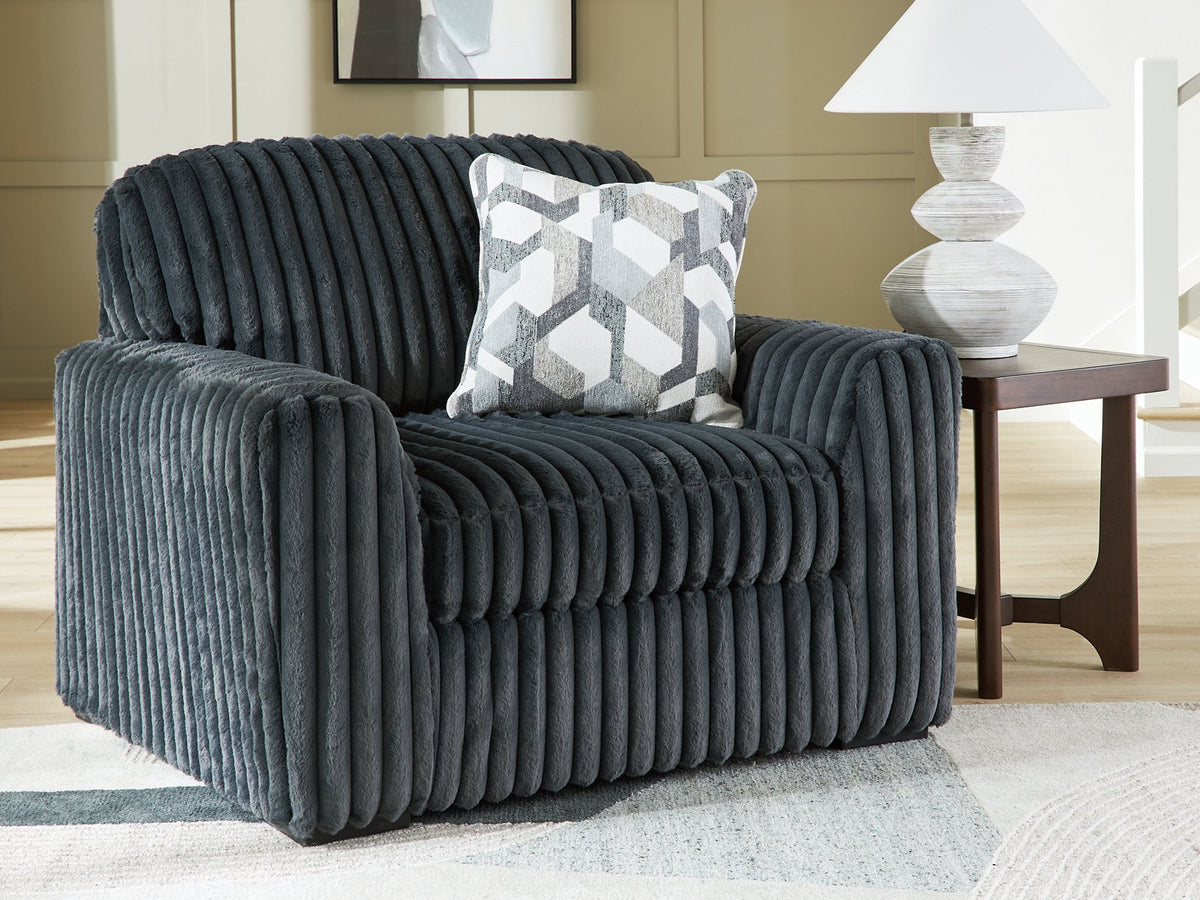 Ashley Furniture Midnight-Madness oversized chair with plush fabric and stylish design, perfect for a modern living room.