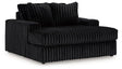 Oversized Midnight-Madness Ashley Furniture chair with plush upholstery and wide seating for a stylish, comfortable lounge.