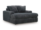 Ashley Furniture Midnight-Madness oversized chaise chair with plush fabric and wide seating, shown from an angled view.