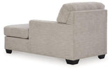 Ashley Furniture Mahoney chaise chair with plush upholstery and sleek design, shown in a modern living room setting.