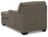 Ashley Furniture Mahoney chaise chair with plush upholstery and sleek design, shown in a modern living room setting.