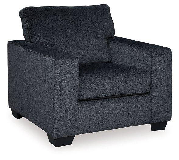Ashley Furniture Altari Chair with plush fabric upholstery and wooden legs, showcasing a modern, comfortable seating design.