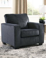Ashley Furniture Altari Chair with plush upholstery and wooden legs, stylishly designed for modern living rooms.
