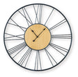 Ashley Furniture Brockett wall clock with a modern round design and sleek black finish, perfect for contemporary home decor.