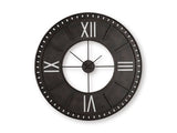 Ashley Furniture Lytle Wall Clock with a sleek round design and modern black finish, mounted on a wall.