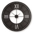 Ashley Furniture Lytle Wall Clock with a round face and modern design, mounted on a wall for stylish home decor.