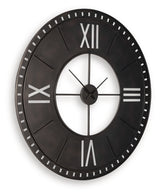 Ashley Furniture Lytle Wall Clock showing a round, stylish clock with modern design and bold black numbers on a white face.