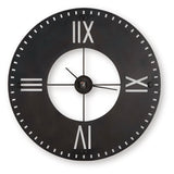 Ashley Furniture Lytle Wall Clock with a sleek round design and modern finish, mounted on a plain wall.