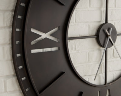 Ashley Furniture Lytle Wall Clock showing a round, stylish clock with a modern design and elegant finish.