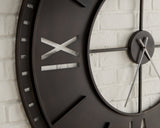 Ashley Furniture Lytle Wall Clock showing a round, stylish clock with a modern design and elegant finish.