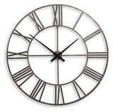 Ashley Furniture Paquita Wall Clock with a stylish round design and modern numerals, perfect for contemporary home decor.
