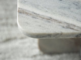 Ashley Furniture Baretton Accent Coffee Table with a sleek cocktail table design and modern profile details.