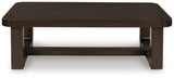 Ashley Furniture Breckington coffee table with a wooden top and metal legs, showcasing a modern cocktail table design.