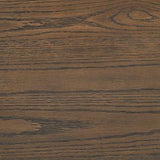 Breckington Ashley Furniture cocktail coffee table with a dark wood finish and sleek modern design.