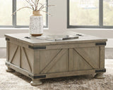 Ashley Furniture Aldwin coffee table with storage, modern cocktail table featuring a sleek design and ample storage space.