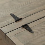 A modern Ashley Furniture Aldwin coffee table with built-in storage, featuring a sleek wooden finish and contemporary design.