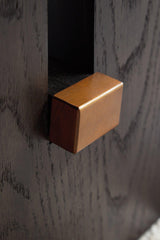 Ashley Furniture Burkhaus coffee cocktail table with a sleek wood finish and modern design, perfect for living room decor.