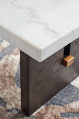 Ashley Furniture Burkhaus coffee cocktail table with a sleek wooden surface and modern design.