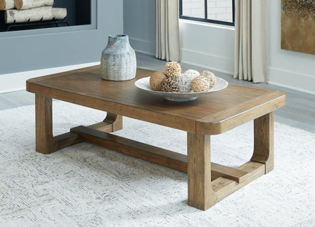 Ashley Furniture Cabalynn coffee table, modern cocktail table with a sleek wooden finish, perfect for living room decor.
