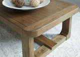 Cabalynn Ashley Furniture cocktail coffee table with wood finish and modern design, placed in a stylish living room setting.