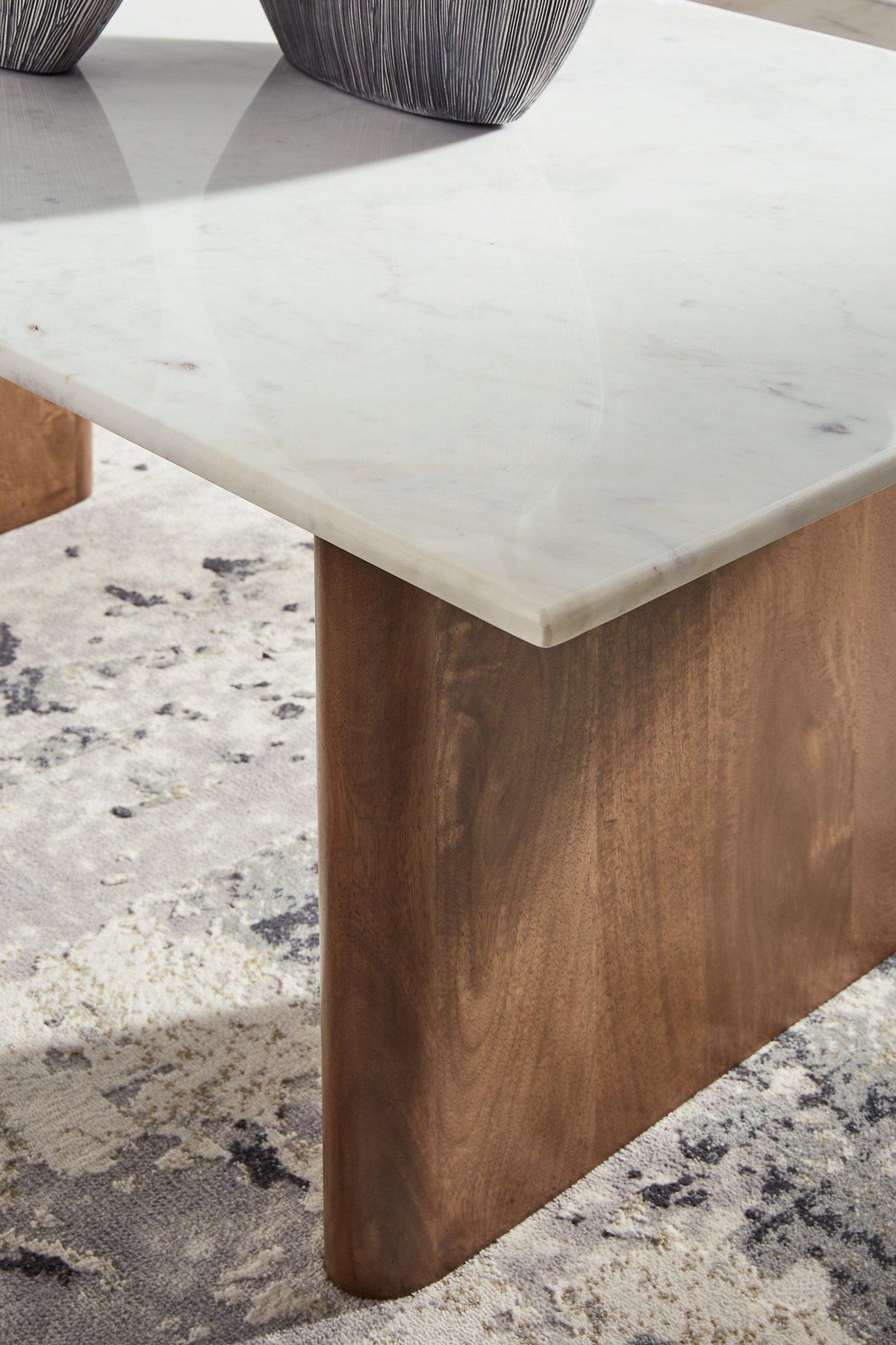 Ashley Isanti Coffee Table, a stylish cocktail table with a wooden finish, perfect for living room decor.