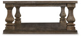 Ashley Johnelle coffee cocktail table with a sleek wooden top and modern design, perfect for living room decor.