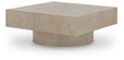 Ashley Furniture Jorielyn coffee table, modern cocktail table with angled wooden legs and a smooth surface, stylish living room accent piece.