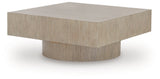 Ashley Furniture Jorielyn coffee table, modern cocktail table with angled wooden legs and a smooth surface, stylish living room accent piece.