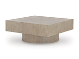 Ashley Furniture Jorielyn coffee table with a modern cocktail design, shown from an angled view featuring a sleek wooden finish.