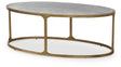 Ashley Furniture Korajane coffee table with a sleek wooden finish and modern design, shown from an angled side view.