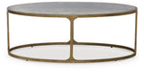 Ashley Furniture Korajane coffee cocktail table with a sleek wood finish and modern design, shown from a front head-on view.