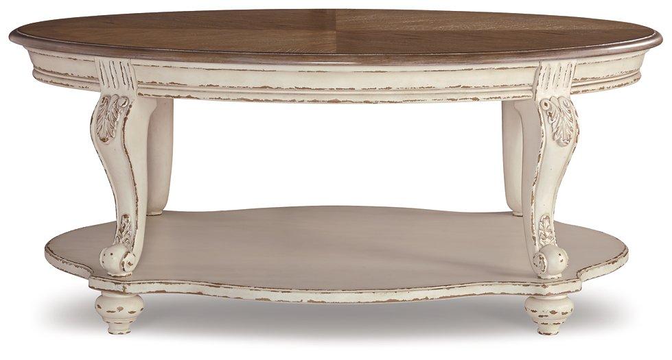 Ashley Furniture Realyn coffee table with a sleek cocktail table design, featuring a smooth wooden surface and modern style.