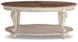 Ashley Furniture Realyn coffee table with a sleek cocktail table design, featuring a smooth wooden surface and modern style.