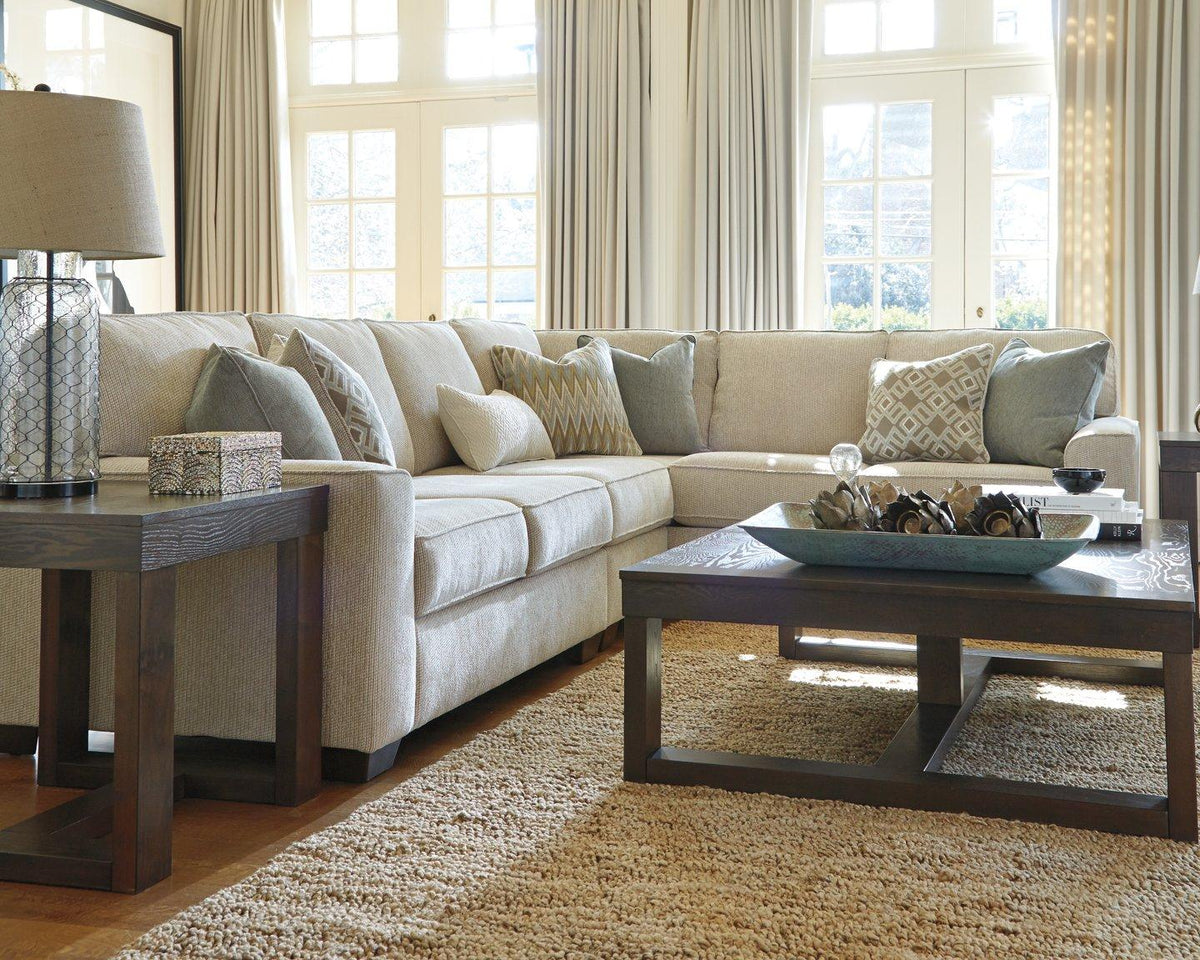 Ashley Furniture Watson coffee table, modern cocktail table with a sleek wooden finish, ideal for living room decor.