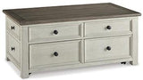 Ashley Furniture Bolanburg coffee table with lift top, modern cocktail table featuring a spacious surface and stylish design.