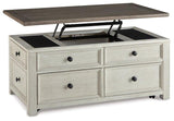 Ashley Furniture Bolanburg coffee table with lift top, showcasing a modern cocktail table with a functional lift mechanism and wood finish.