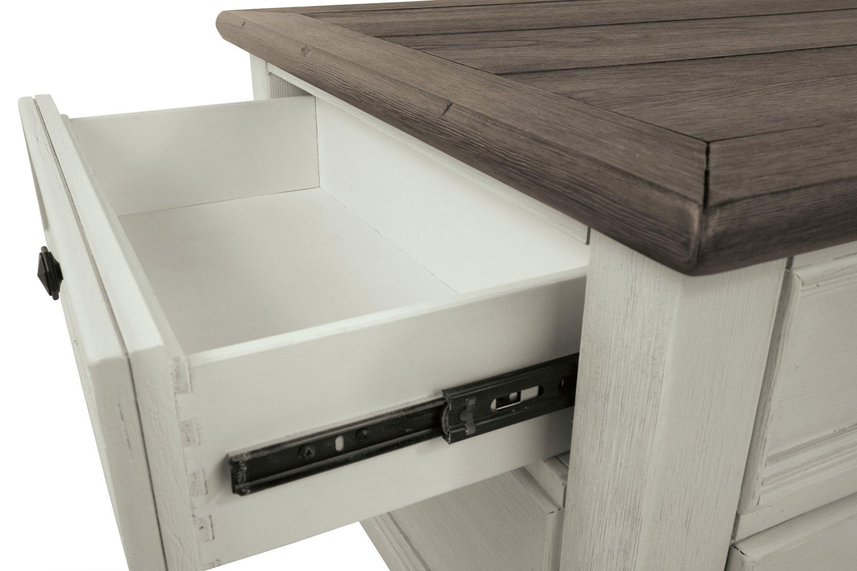 Ashley Bolanburg coffee table with lift top, featuring a modern cocktail table design with storage and a sleek wood finish.