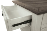 Ashley Bolanburg coffee table with lift top, featuring a modern cocktail table design with storage and a sleek wood finish.
