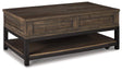 Ashley Furniture Johurst Coffee Table with Lift Top, modern cocktail table showing the lift mechanism and sleek wood finish.