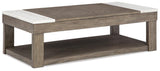 Lift-top Ashley Furniture Loyaska cocktail coffee table with wood finish and hidden storage, featuring a functional lift top design.