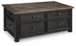 Ashley Furniture Tyler Creek coffee table with lift top, wooden cocktail table featuring a functional lift mechanism and storage space.