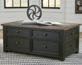 Ashley Furniture Tyler Creek coffee table with lift top, modern cocktail table featuring a functional lift mechanism and spacious surface.