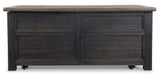 Ashley Furniture Tyler Creek coffee table with lift top, showcasing a wooden cocktail table with functional lift mechanism and storage.