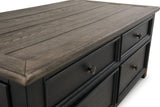 Ashley Furniture Tyler Creek coffee table with lift top, modern cocktail table featuring a spacious surface and storage.