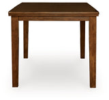 Ashley Furniture Ralene counter height dining extension table with a wooden finish and sturdy legs, perfect for modern dining spaces.