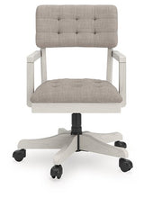 Ashley Furniture Robbinsdale home office desk chair with cushioned seat and backrest, black upholstery, and adjustable height.