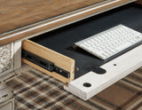 Realyn 2-piece home office desk set by Ashley Furniture featuring a sleek, modern design with spacious work surfaces and storage.