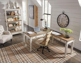 Realyn 2-piece home office desk by Ashley Furniture, featuring a modern design with a spacious workspace and sleek wood finish.