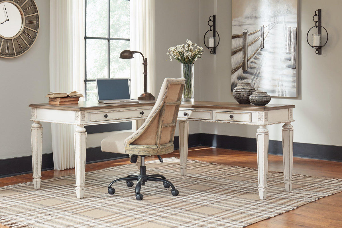 Realyn 2-piece home office lift top desk by Ashley Furniture, showing the desk with adjustable lift top and modern wood finish.